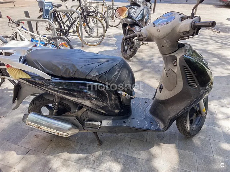 Honda PS 125i Passion – Vista 11