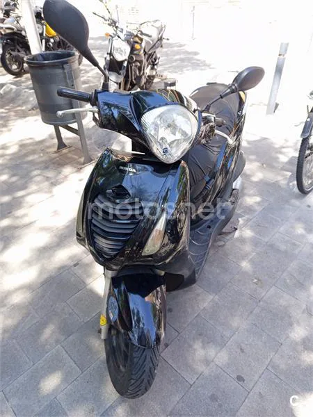 Honda PS 125i Passion – Vista 7