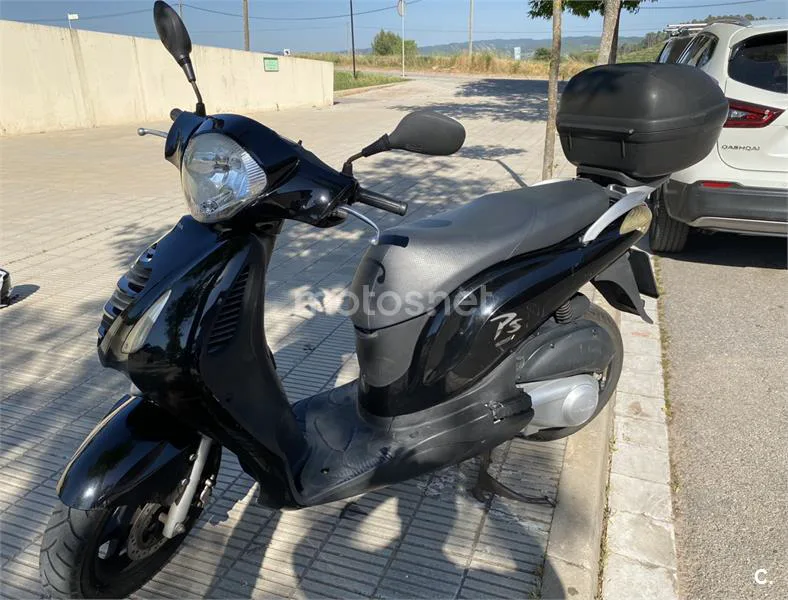 Honda NES 125 – Vista 3