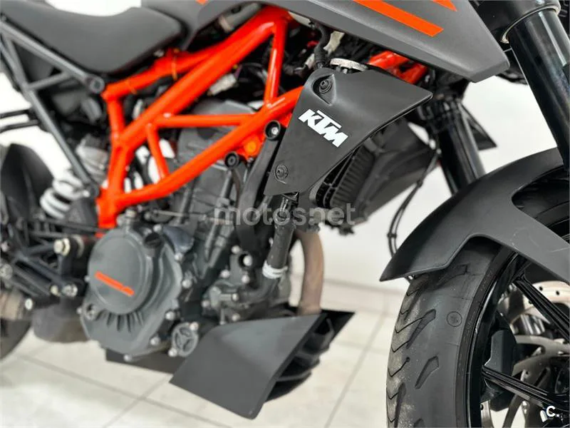 KTM 125 – Vista 14