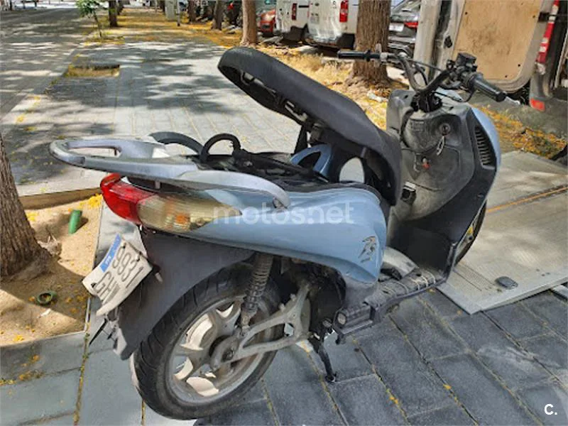 Honda Pasión 125 - Vista 4