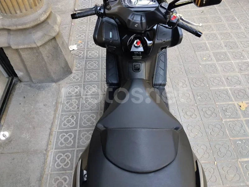 Kymco Xciting 400 – Vista 7