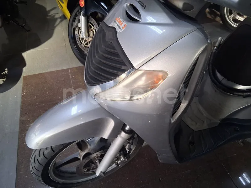 Honda SH125i - Vista 13