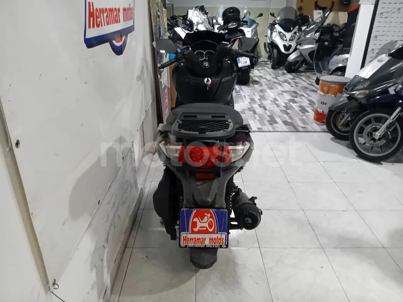 SYM Joymax 125 - Vista 6