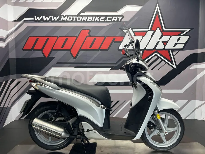 Honda SH125i 1999 € 2010 Barcelona - 1