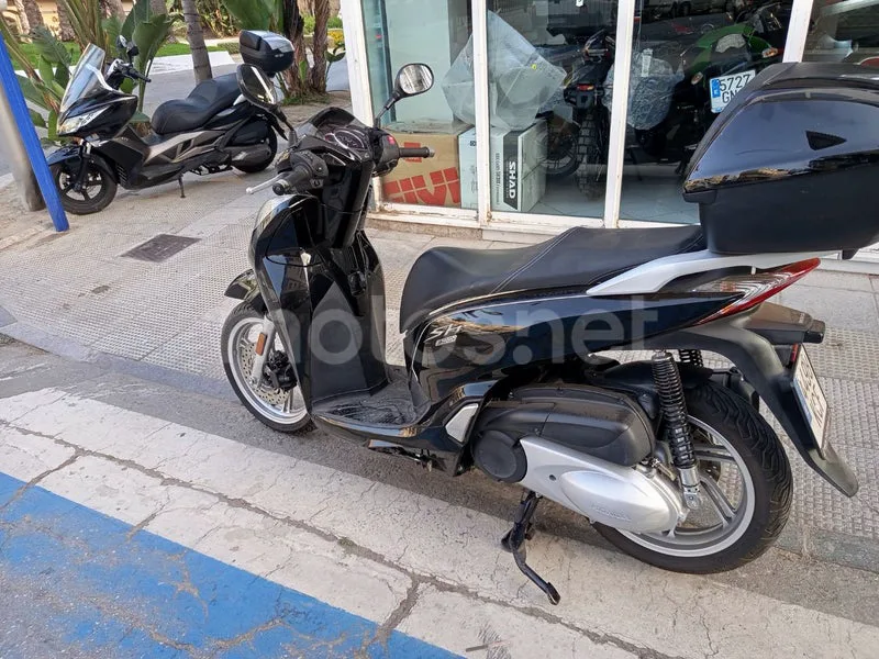 Honda SH300i - Vista 7