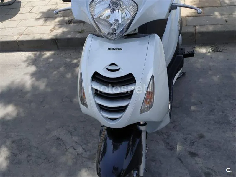 Honda Pasión 125 - Vista 3