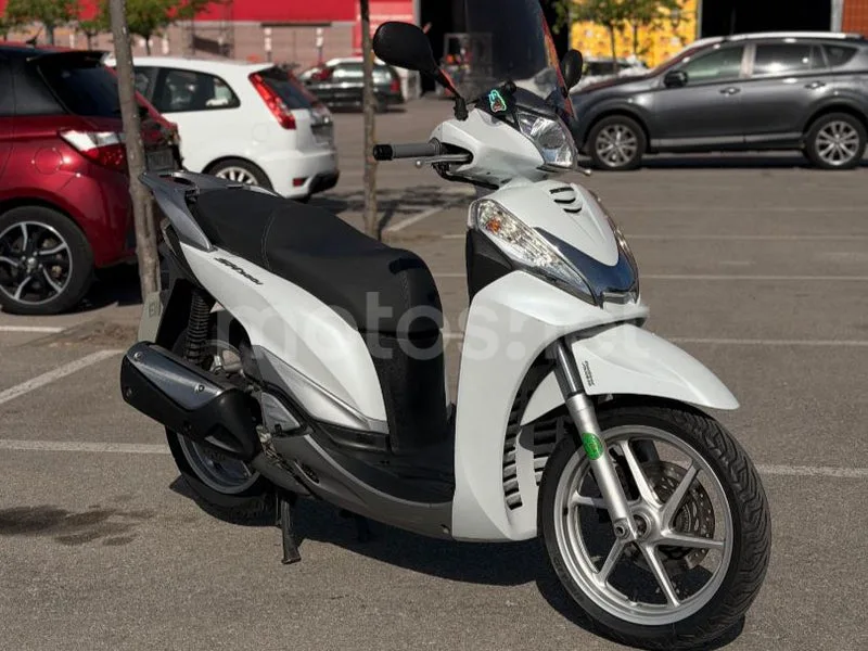 Honda SH300i - Vista 7