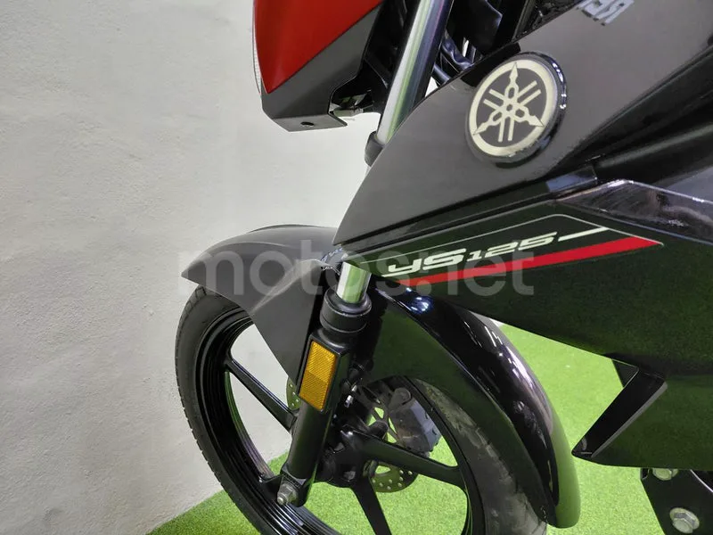 Yamaha YS125 - Vista 14
