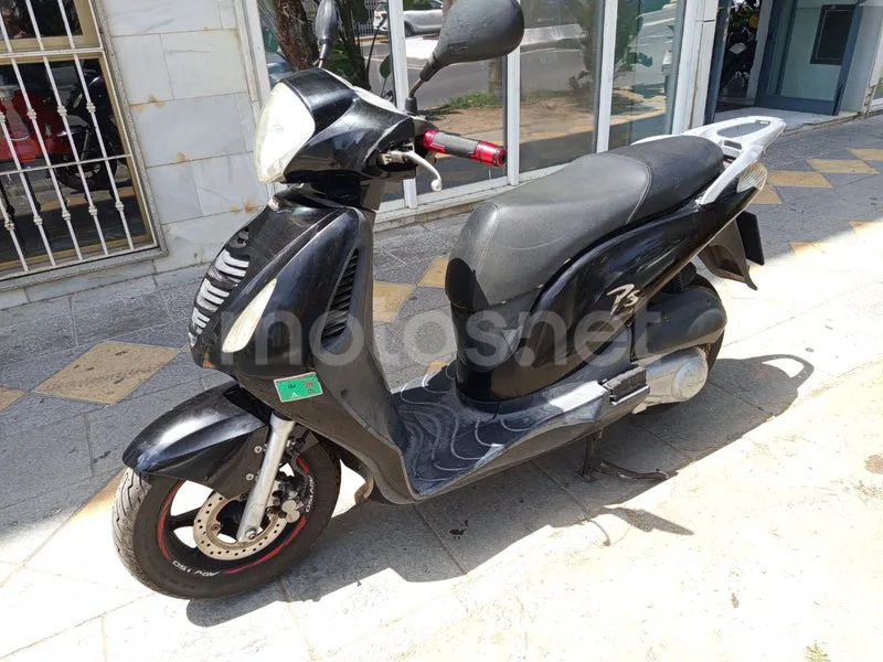 Honda Pasión 125 - Vista 4