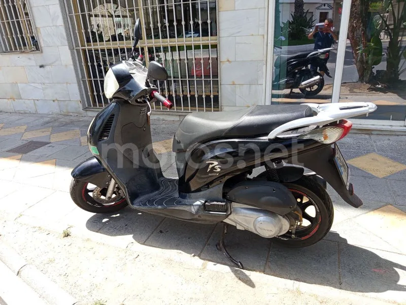 Honda Pasión 125 - Vista 8
