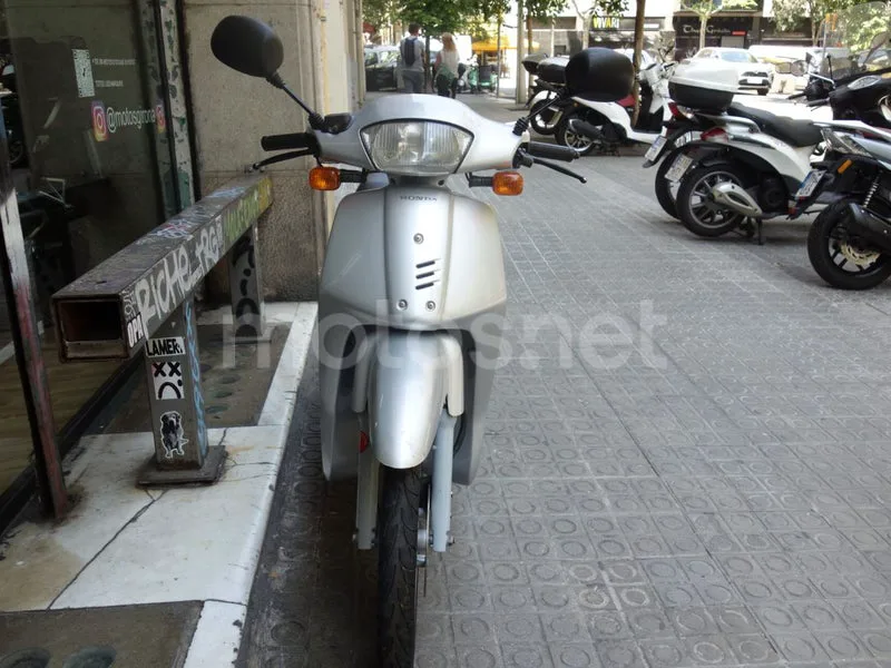Honda SH100 - Vista 7