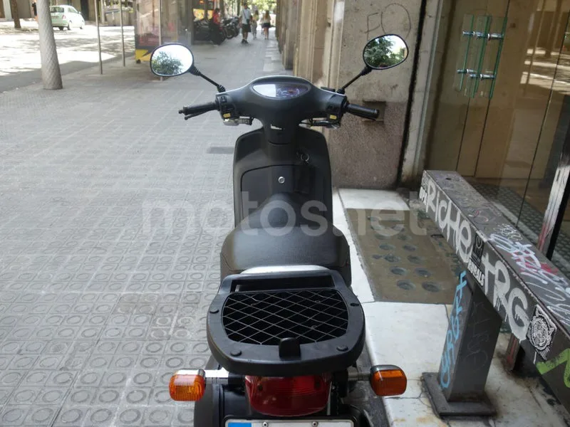 Honda SH100 - Vista 10