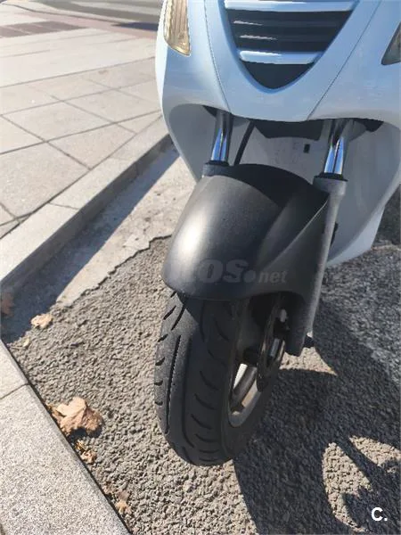 Honda NES 125 – Vista 7