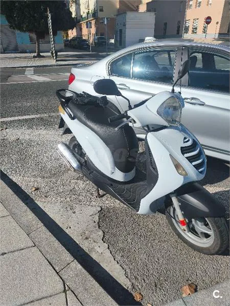 Honda NES 125 – Vista 9