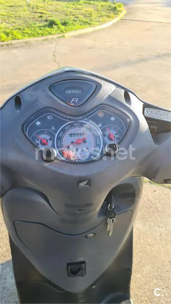 Honda Passion 150i – Vista 7