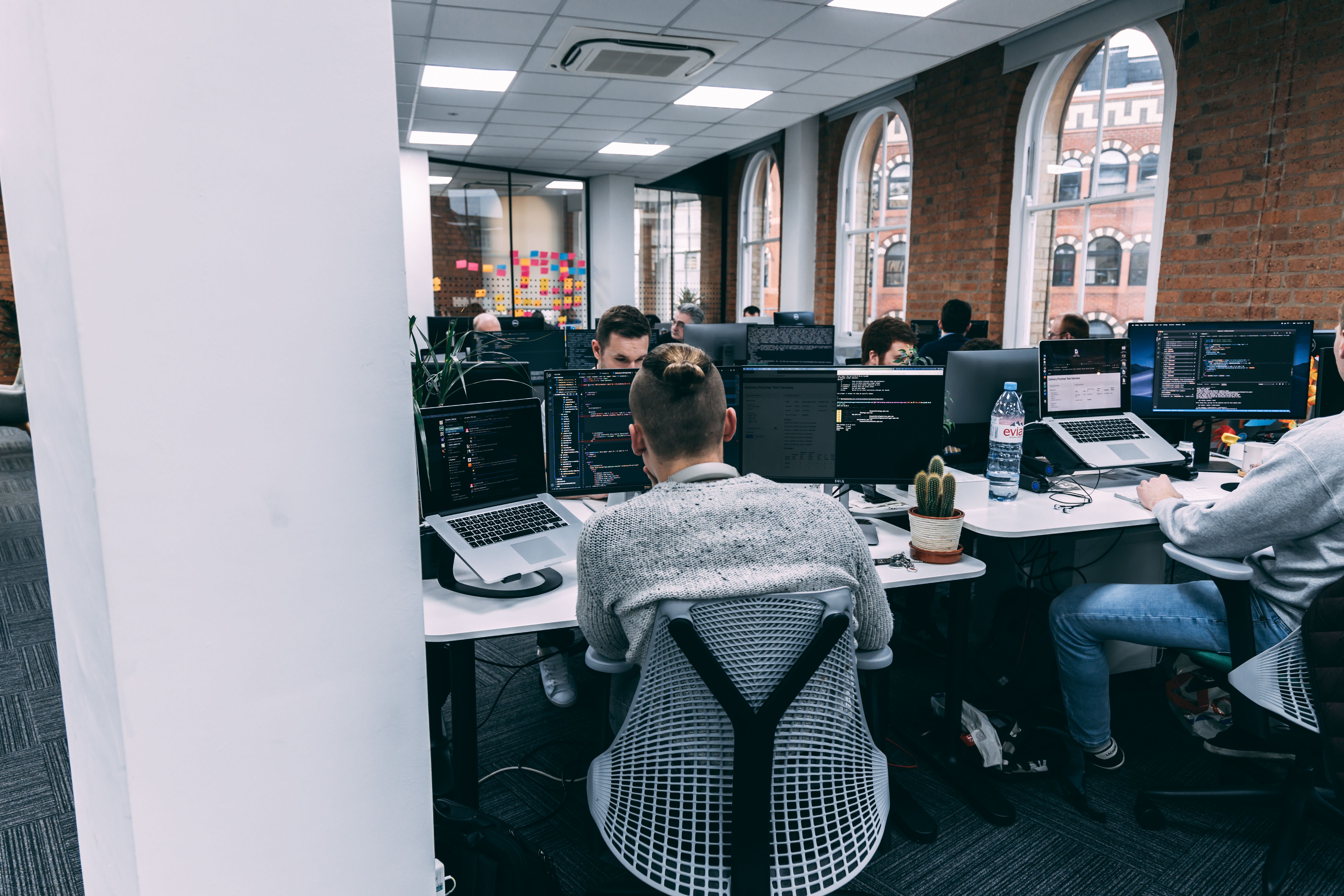 Team of software developers working in the same room