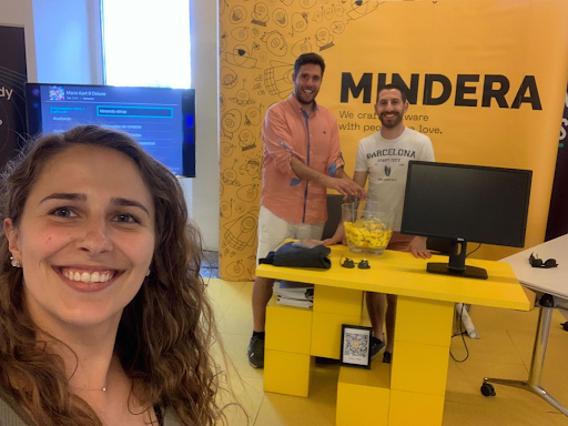 Pedro Soares, Ana Santos, and Ricardo Silva in front of the Mindera stand at JNation in June 2022. 