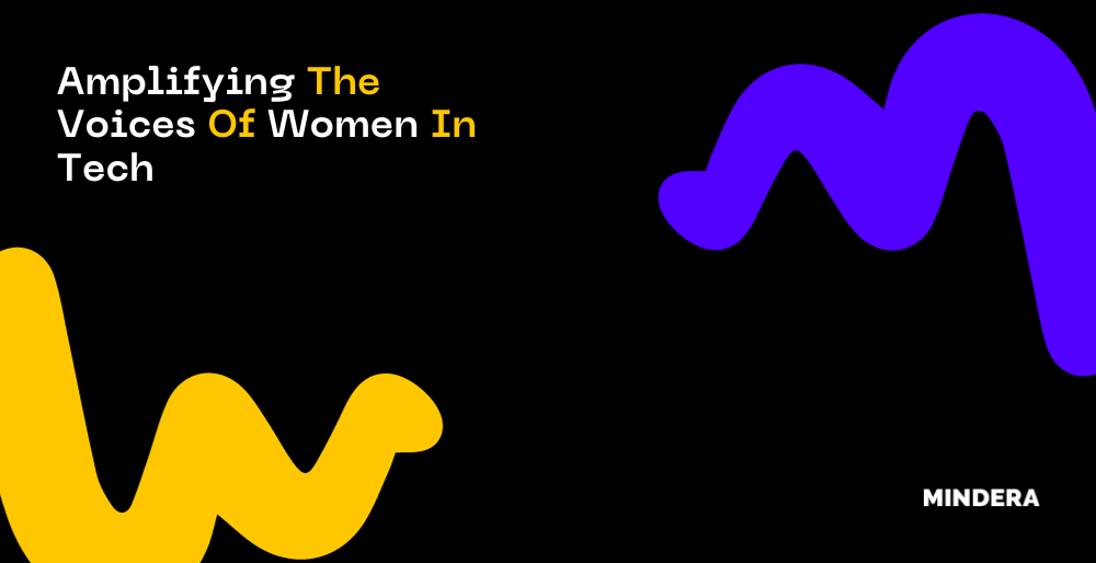 A black background image with Mindera Squiggles in the top right corner and bottom left corner. The Text reads "Amplifying the voices of women in tech"