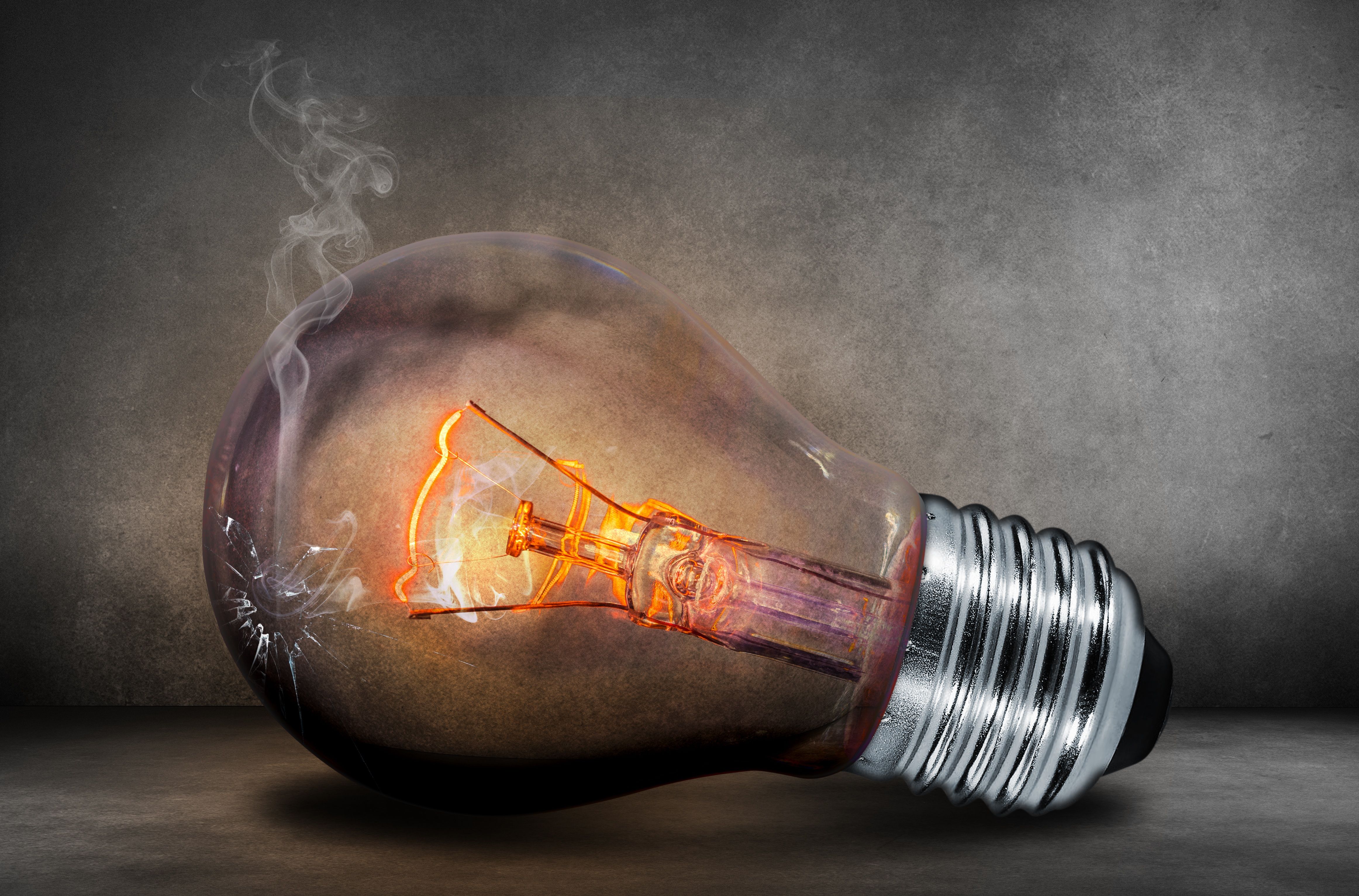 A broken light bulb with a smoking filament is used as the featured image for a blog post about energy dashboards.