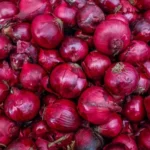 Extends ban on onion exports