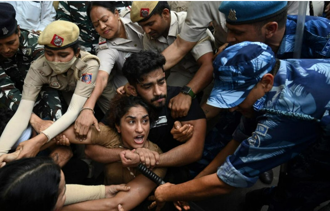 wrestles immerse medal ganga river