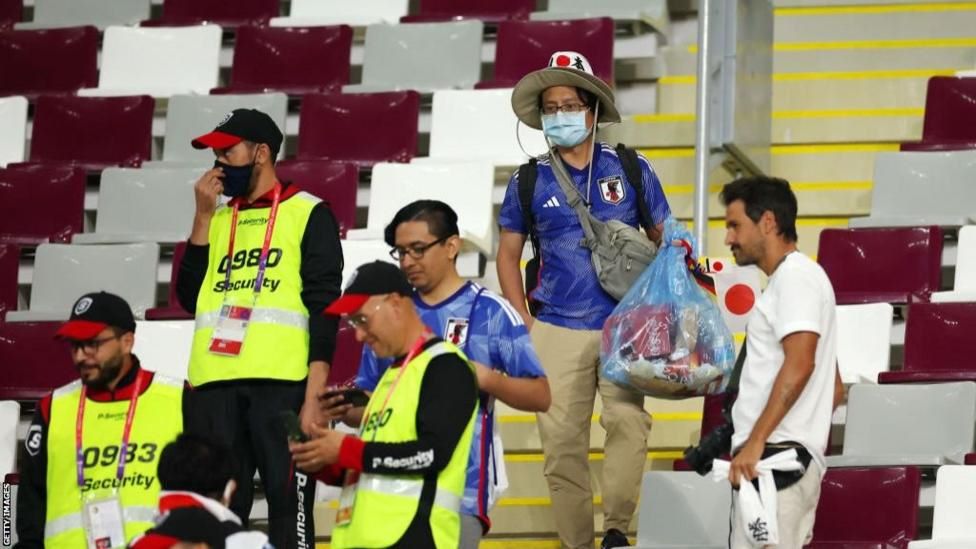 japanese fans win praise stadium cleaning world cup