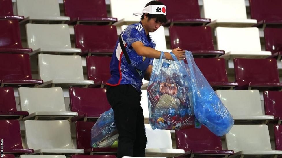 japanese fans win praise stadium cleaning world cup