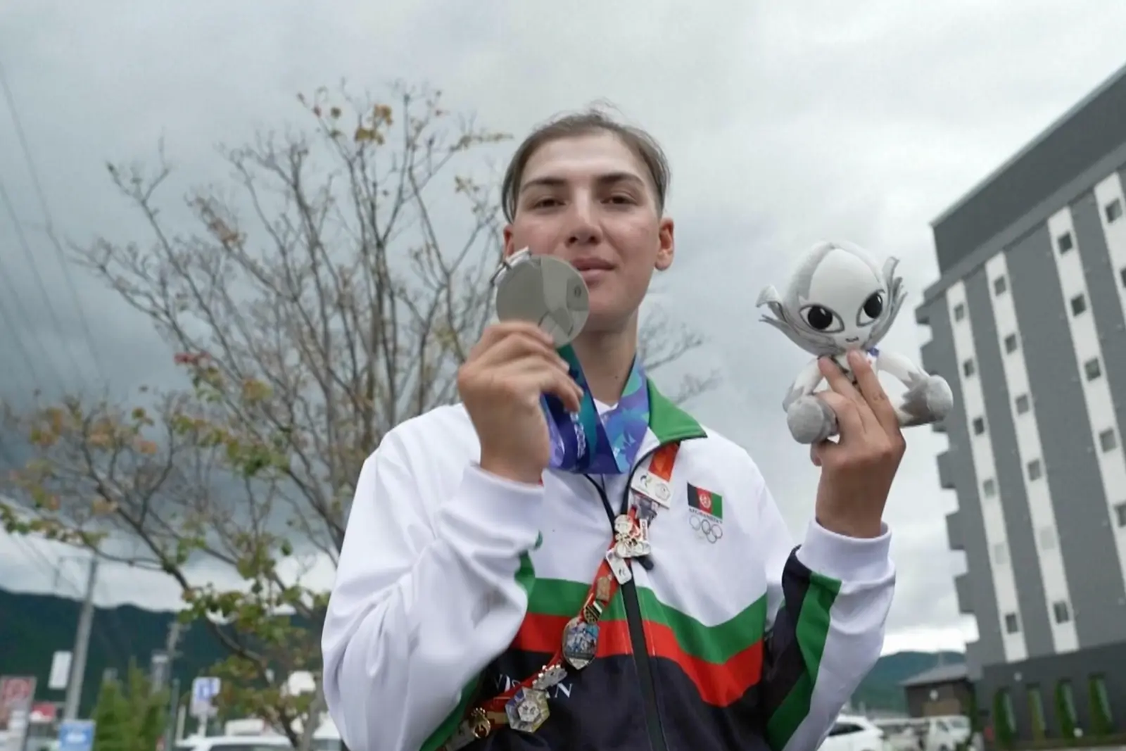 Afghan Female Cyclist Wins Medal After Training Disguised as Man