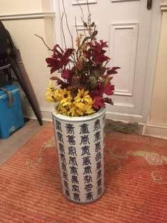 Porcelain vase with fake flower 