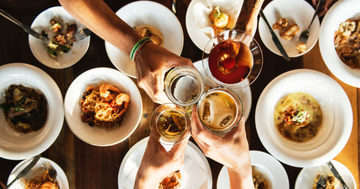 Cheers around the dinner table gratitude 768x403