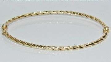 9ct yellow gold ladies bangle   twisted design   new   gift boxed code 109