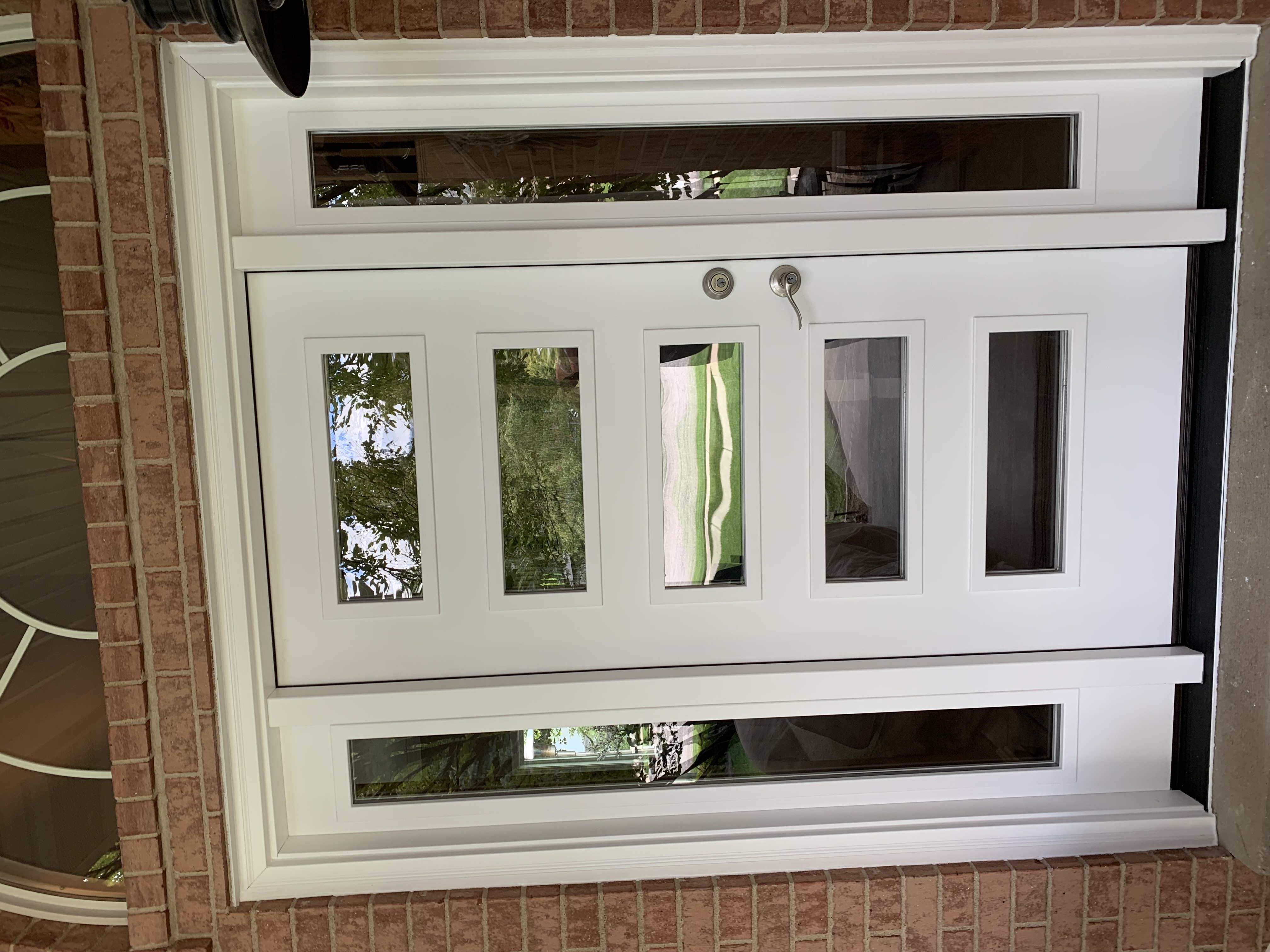Various entry and patio doors showcasing different materials in a home setting