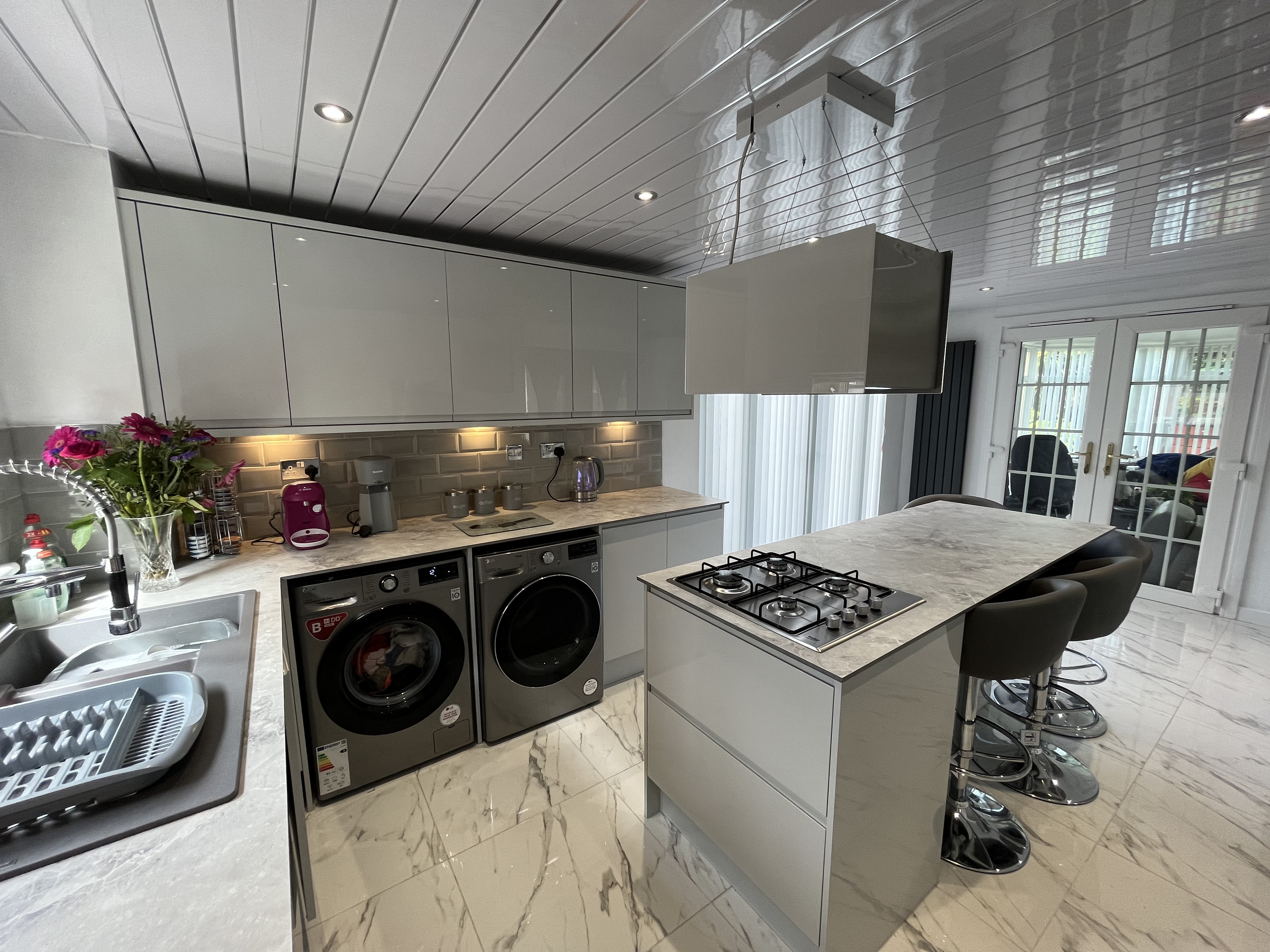 Modern Howdens kitchen with integrated appliances