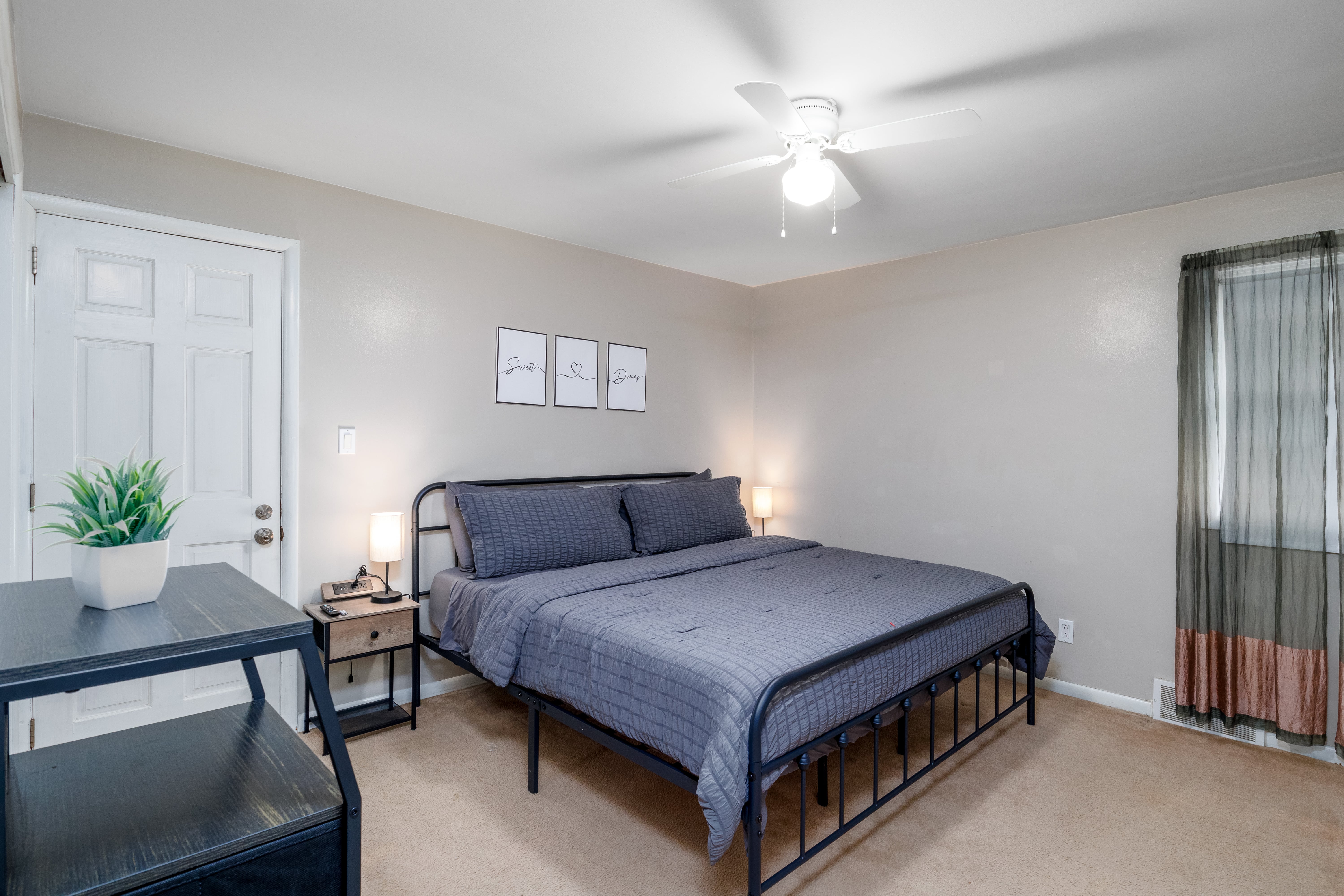 Comfortable master bedroom with king-sized bed and luxury linens.