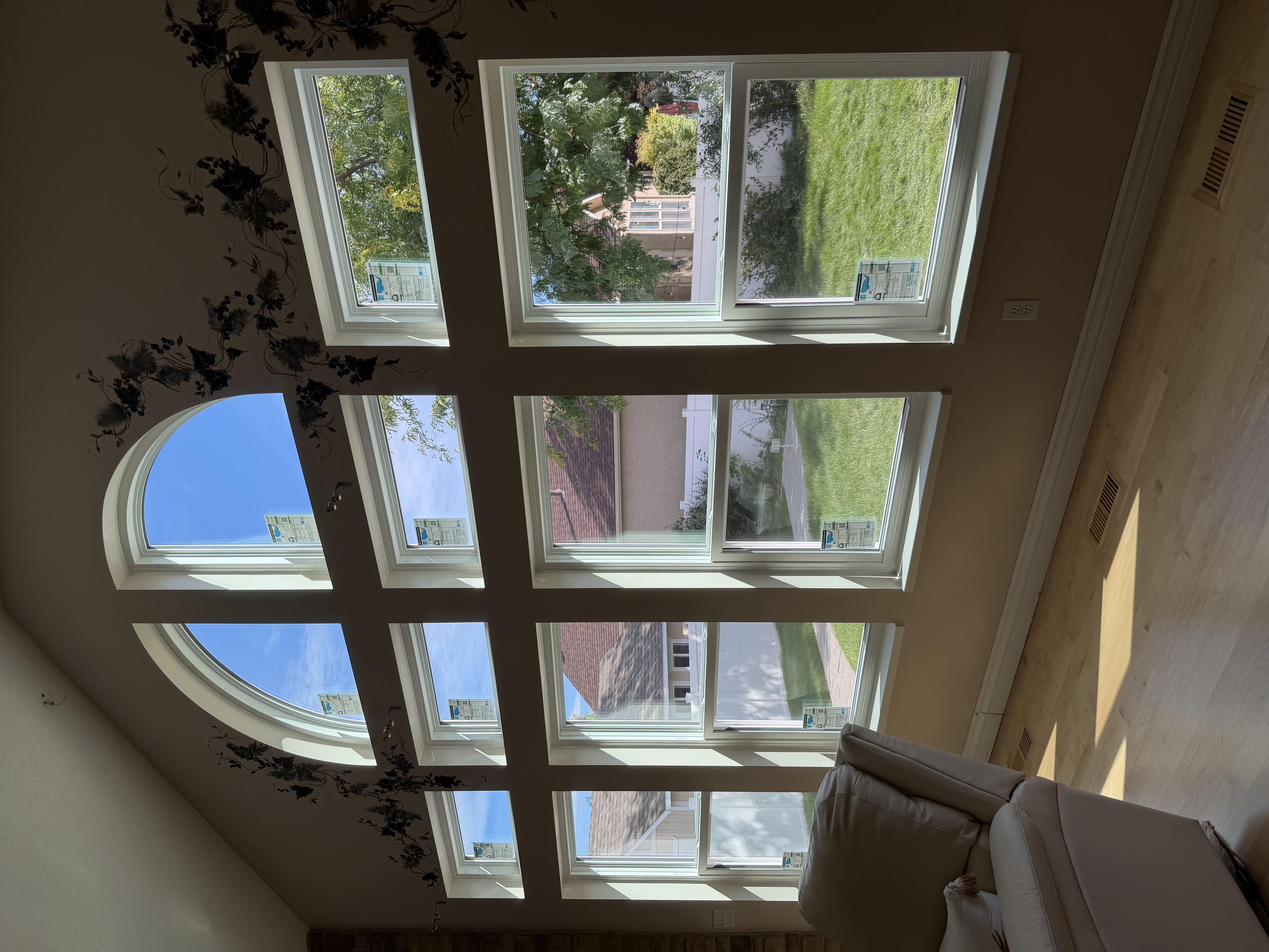 Before and after photos of Syracuse home window replacement showing ProVia Endure Triple Pane installation