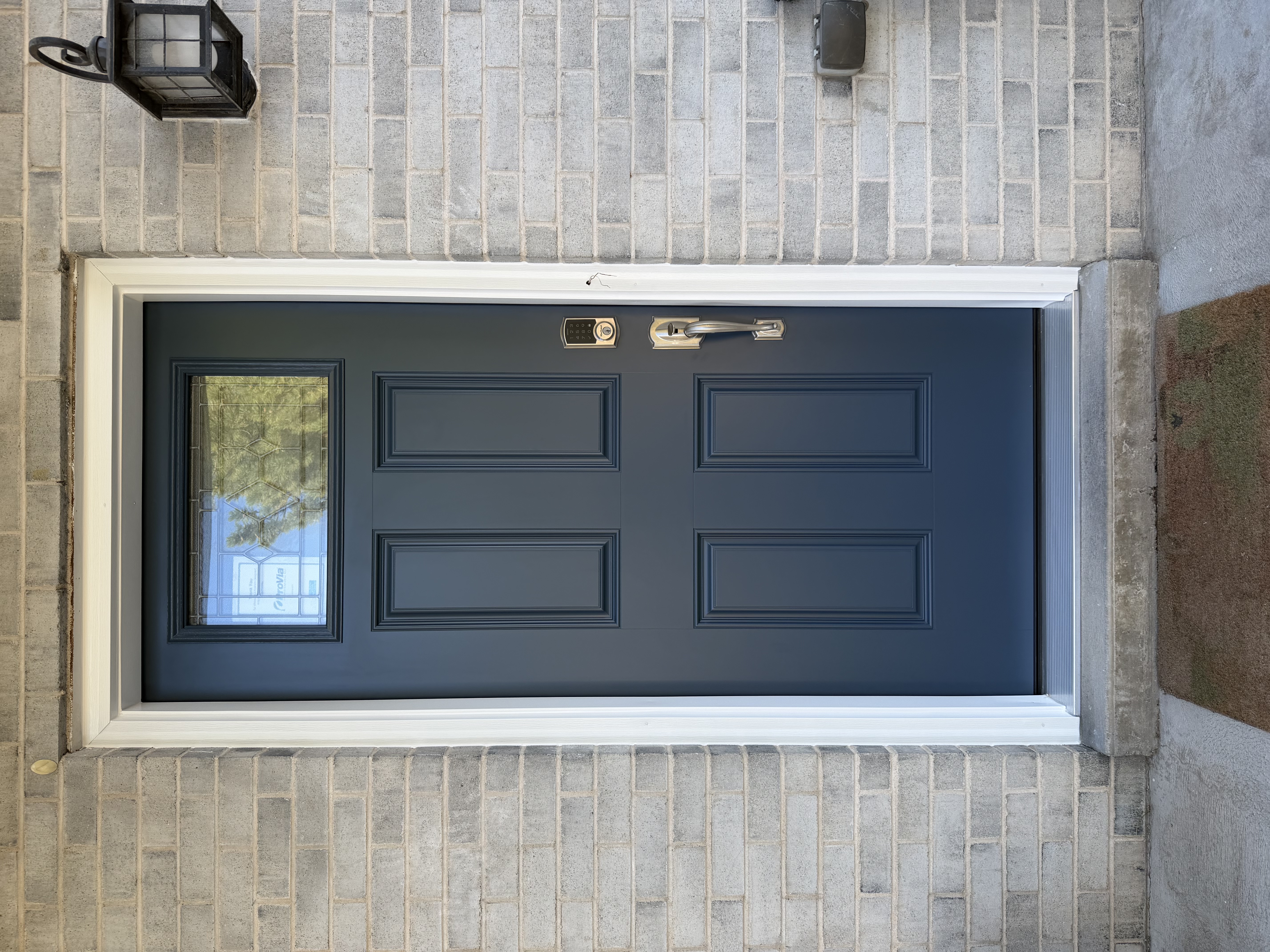 Before and after transformation of Provia entry door in a residential setting