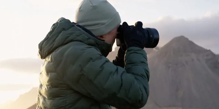 Photographer shooting in the mountains