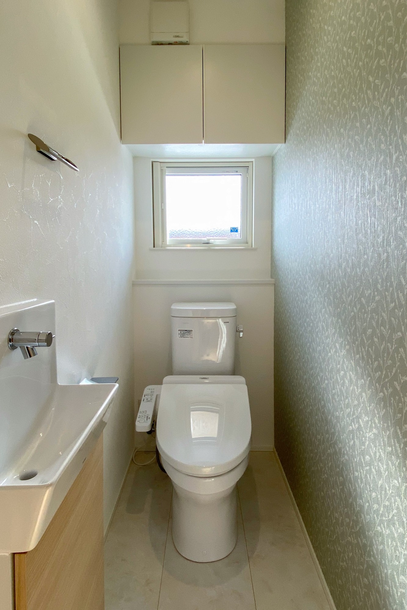 趣味室のある2世帯住宅のトイレ写真