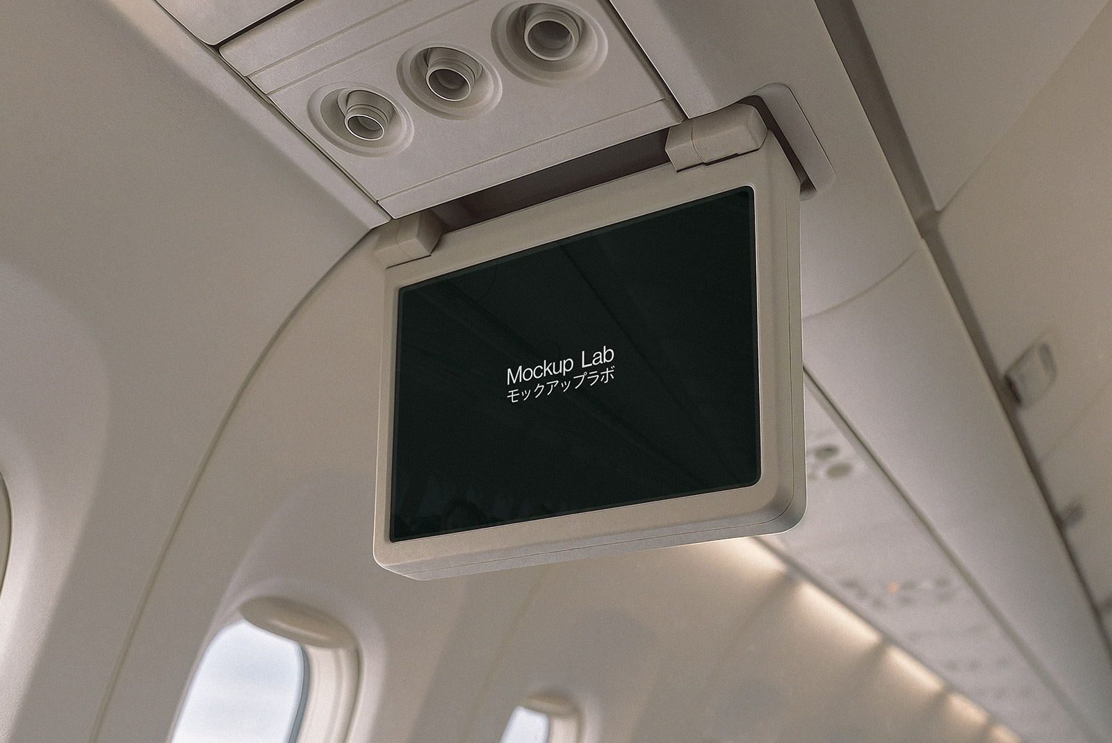 A close-up view of a digital design displayed on an airplane seatback screen.