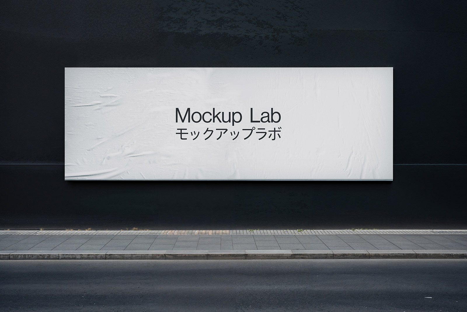 Front view of a large billboard mockup against a clear blue sky, showcasing design.