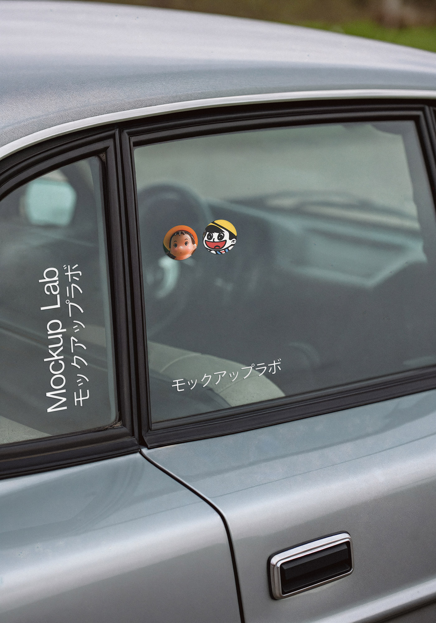 Close-up view of a car window sticker design applied to the rear passenger window.