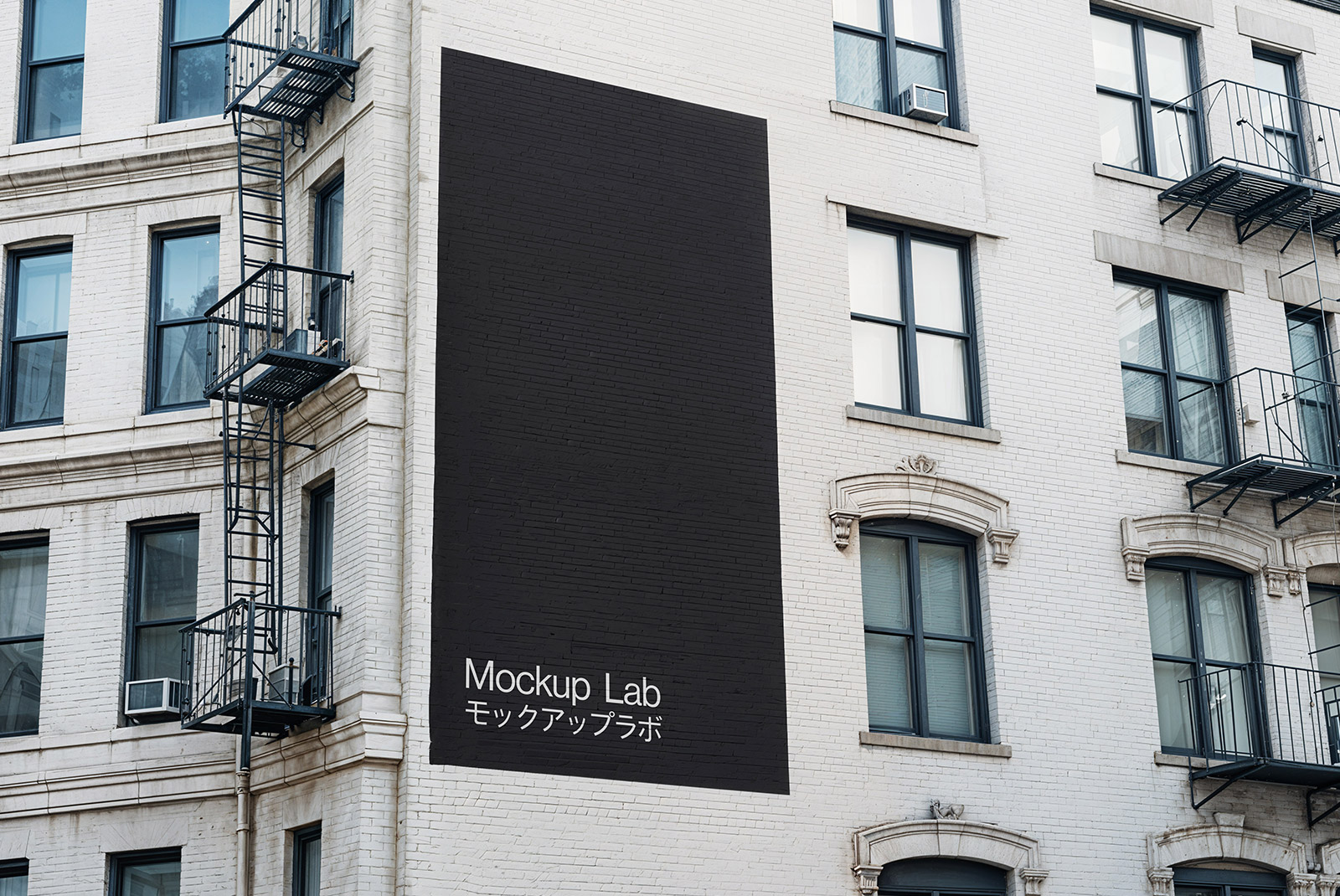 A large mural design displayed prominently on the side of a modern building.