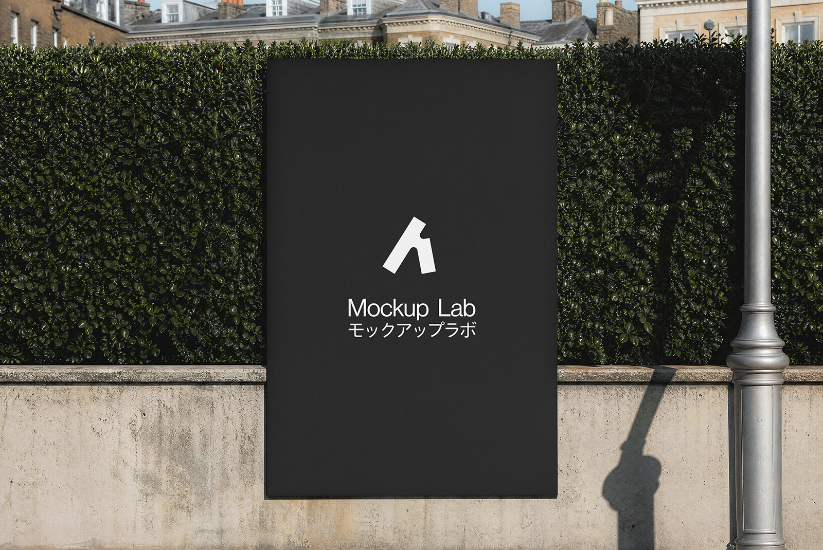 Close-up view of a poster mockup mounted on a textured urban wall.