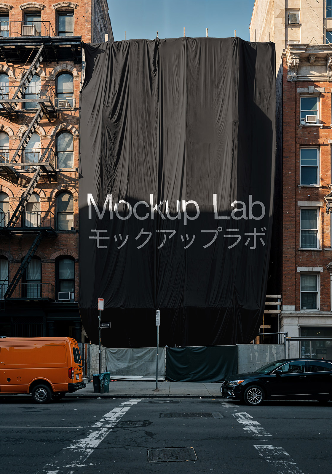 A large scaffold cover design displayed prominently on a building facade in an urban environment.