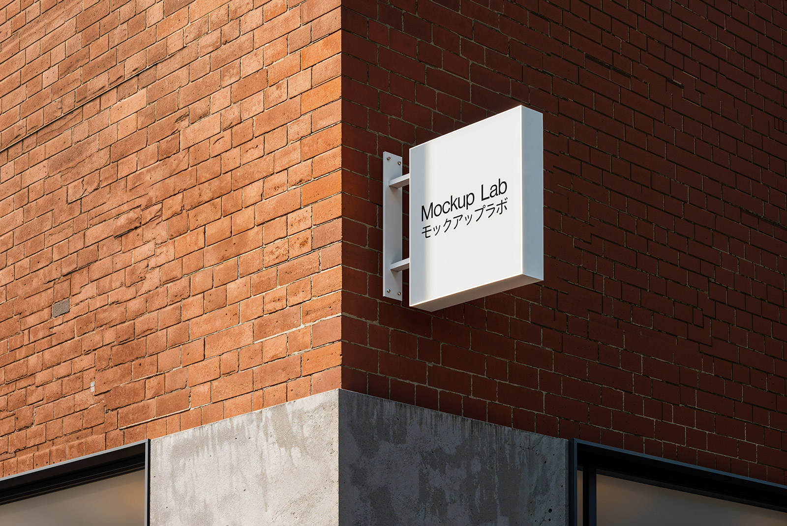 Front view of a rectangular sign mounted on a brick wall, showcasing a logo.