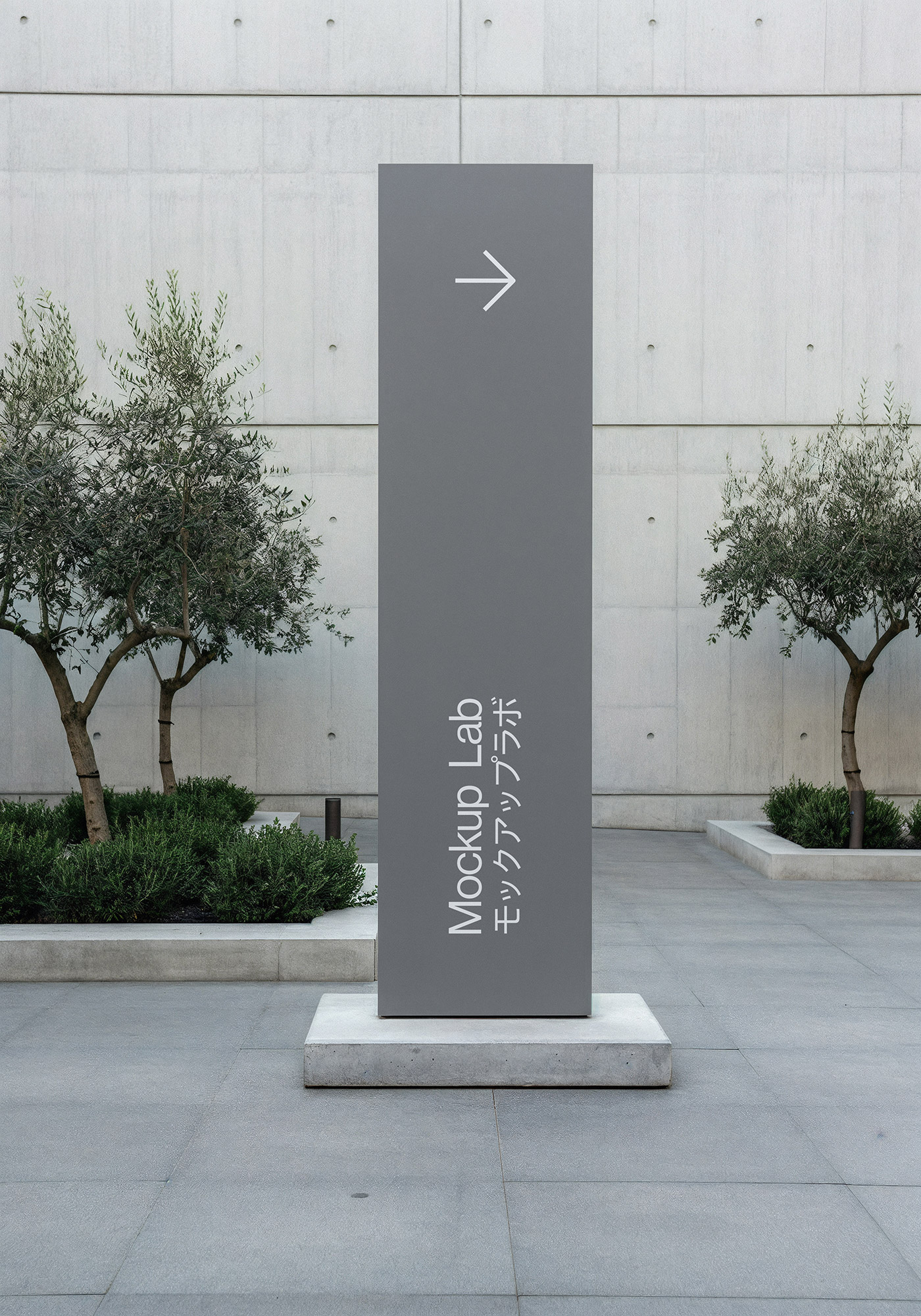 Front view of a rectangular outdoor sign mockup attached to a building wall.