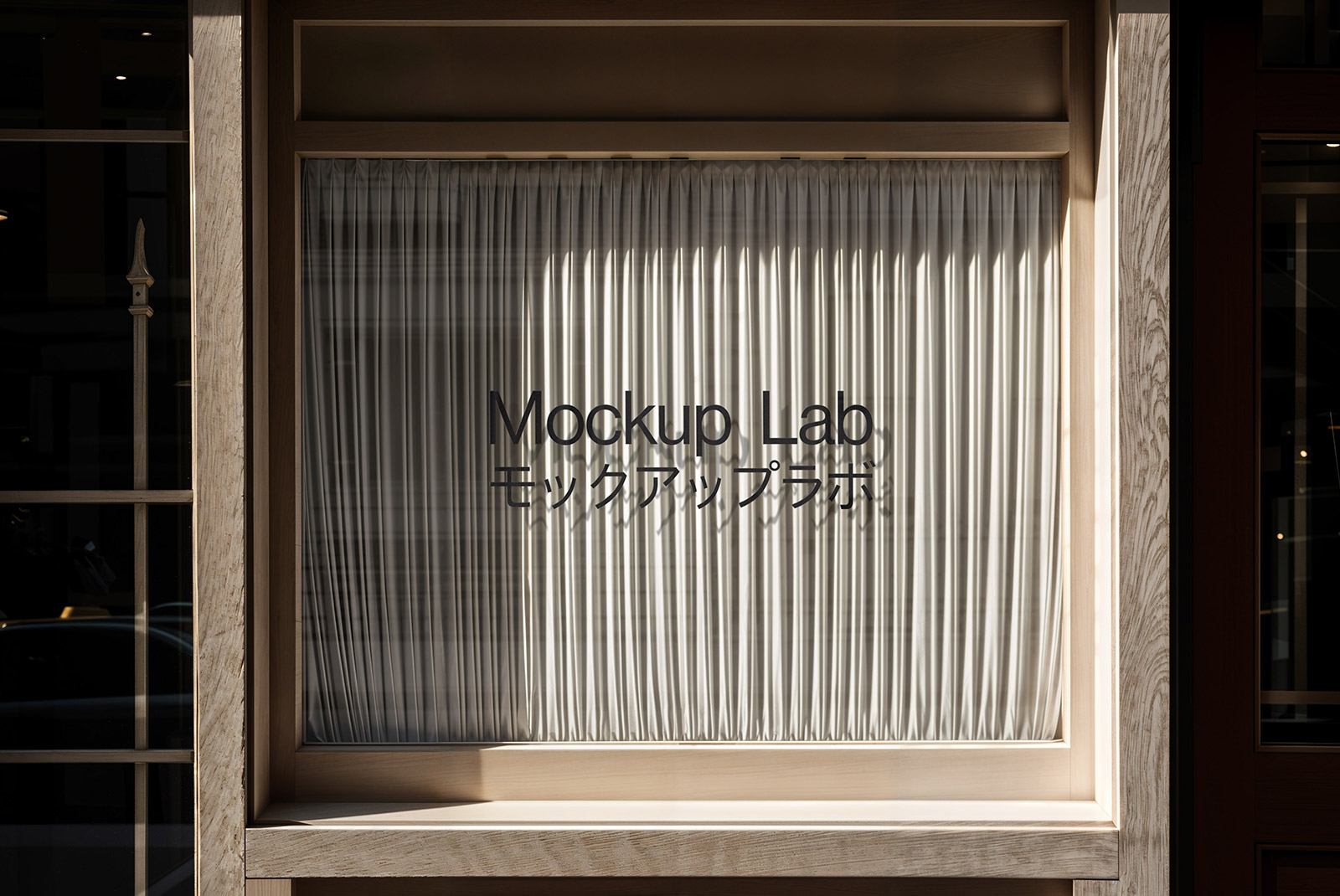 Front view of a modern storefront design mockup with prominent window graphics.