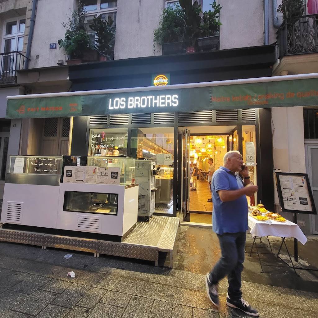 Los Brothers Paris - Window Building Facade City Street