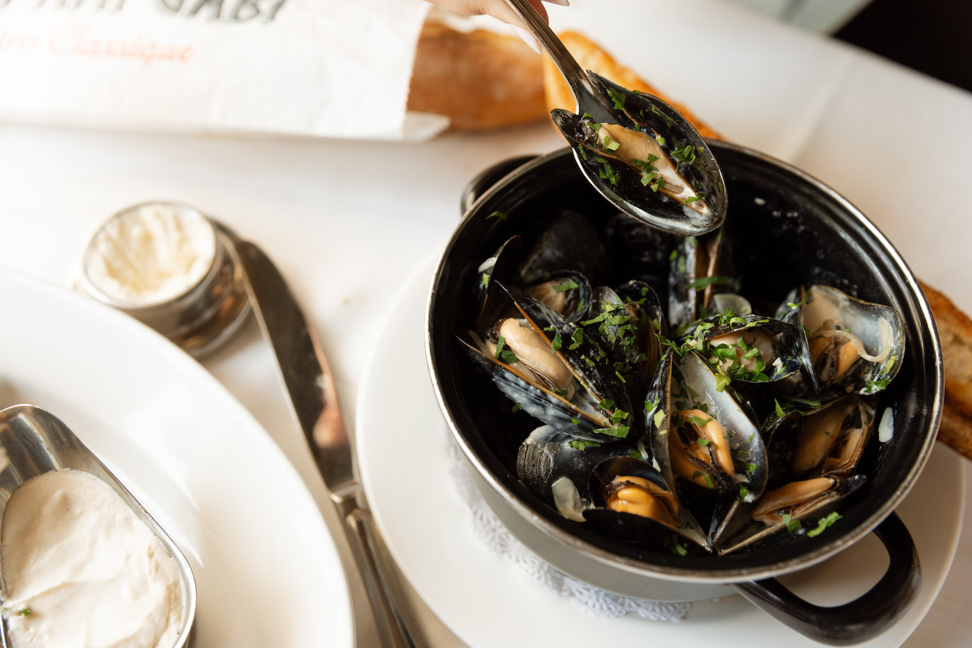 Mon Ami Gabi pot of mussels, available on New Year's Day